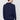 Back view of man wearing a navy blue long sleeve polo shirt with white trousers