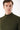Man wearing an olive green mock neck sweater, close-up, minimalist fashion style