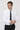 Man wearing white slim fit dress shirt, black polka dot tie, and black trousers