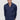 Man wearing navy blue slim fit long sleeve shirt and beige pants, front view
