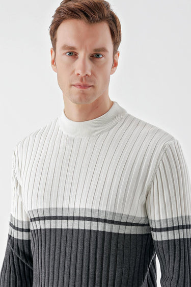 Man wearing ribbed, gradient grey and white knit sweater, close-up, fashion clothing