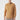Man wearing camel basic half turtleneck sweater and beige pants on white background