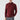 Man wearing a dark burgundy turtleneck sweater and gray plaid trousers