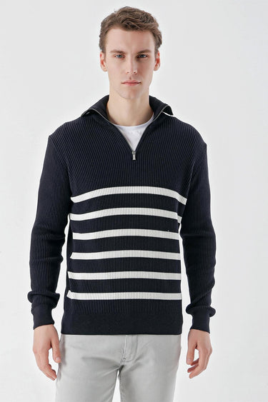Man wearing navy blue half-zip striped sweater with white horizontal lines