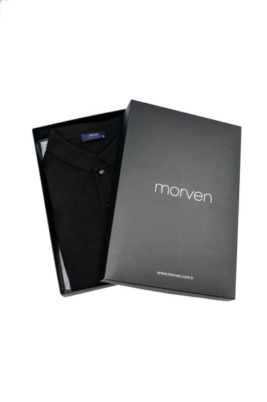 Black polo shirt neatly folded in a black gift box with Morven branding