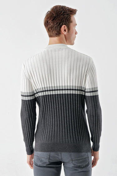 Man wearing ribbed knit colorblock pullover with white and anthracite grey panels, back view
