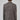 Back view of a man wearing a brown checked knit blazer and beige trousers