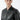 Man wearing a black faux leather zip-up jacket with side pockets, modern fashion style