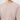Man wearing a taupe basic crew neck sweatshirt, close-up on upper body